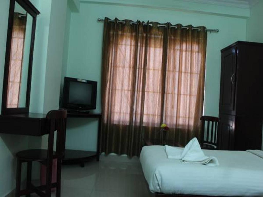 Sm Regency Kochi Cameră foto